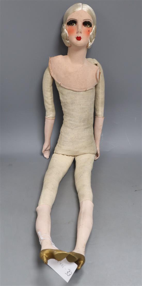 An Art Deco doll, no clothes, fabric head separate, height 80cm